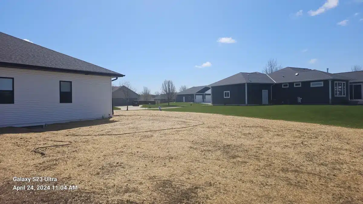 Lawn seeding with straw mulch Manitowoc — Fast Grass Lawns